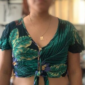 Patrons of peace tropical crop top